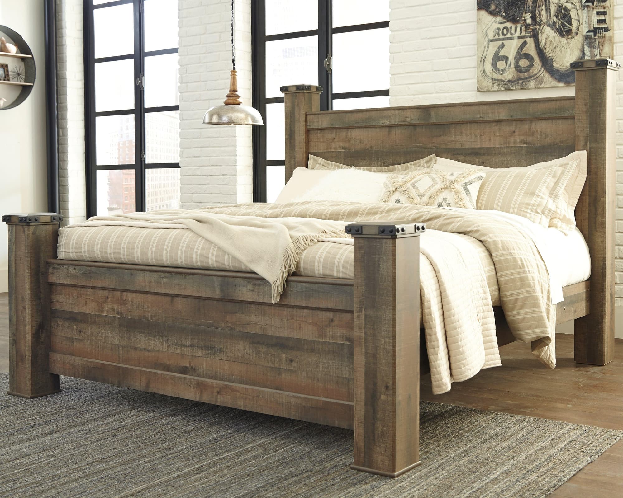 Trinell Brown King Poster Bed - Image 1