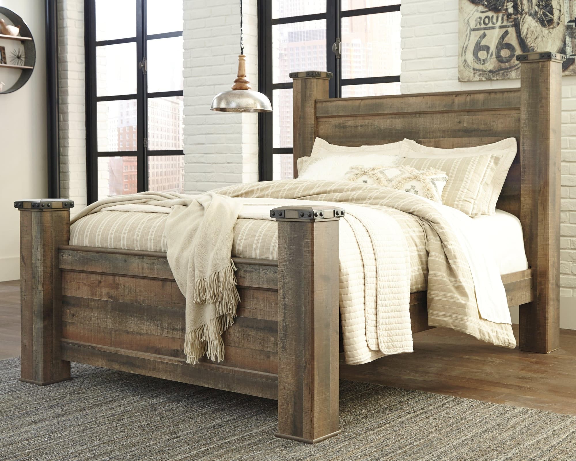 Trinell Brown Queen Poster Bed - Image 1