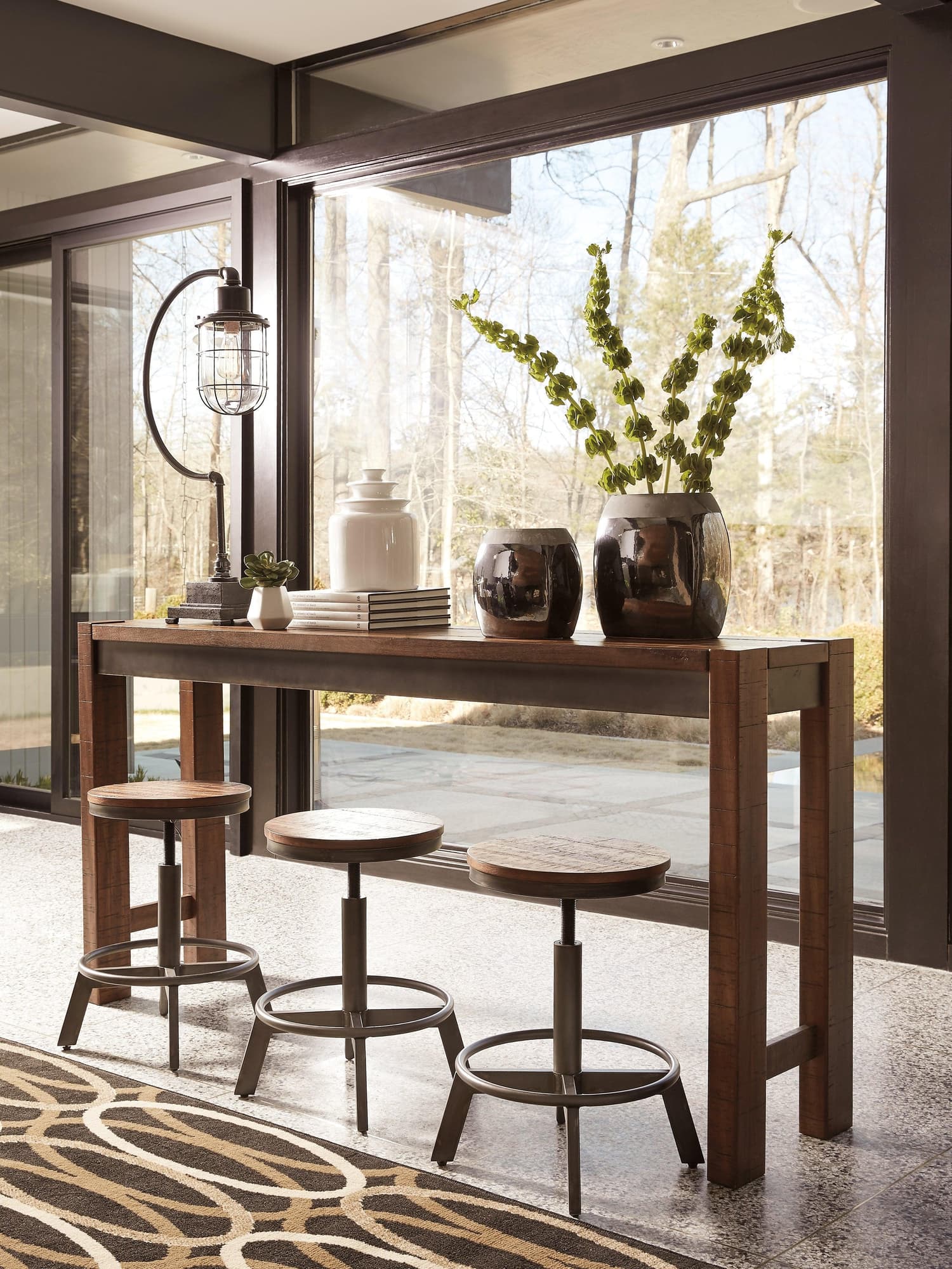 Torjin Brown Gray Counter Height Dining Table And 4 Barstools - Image 1
