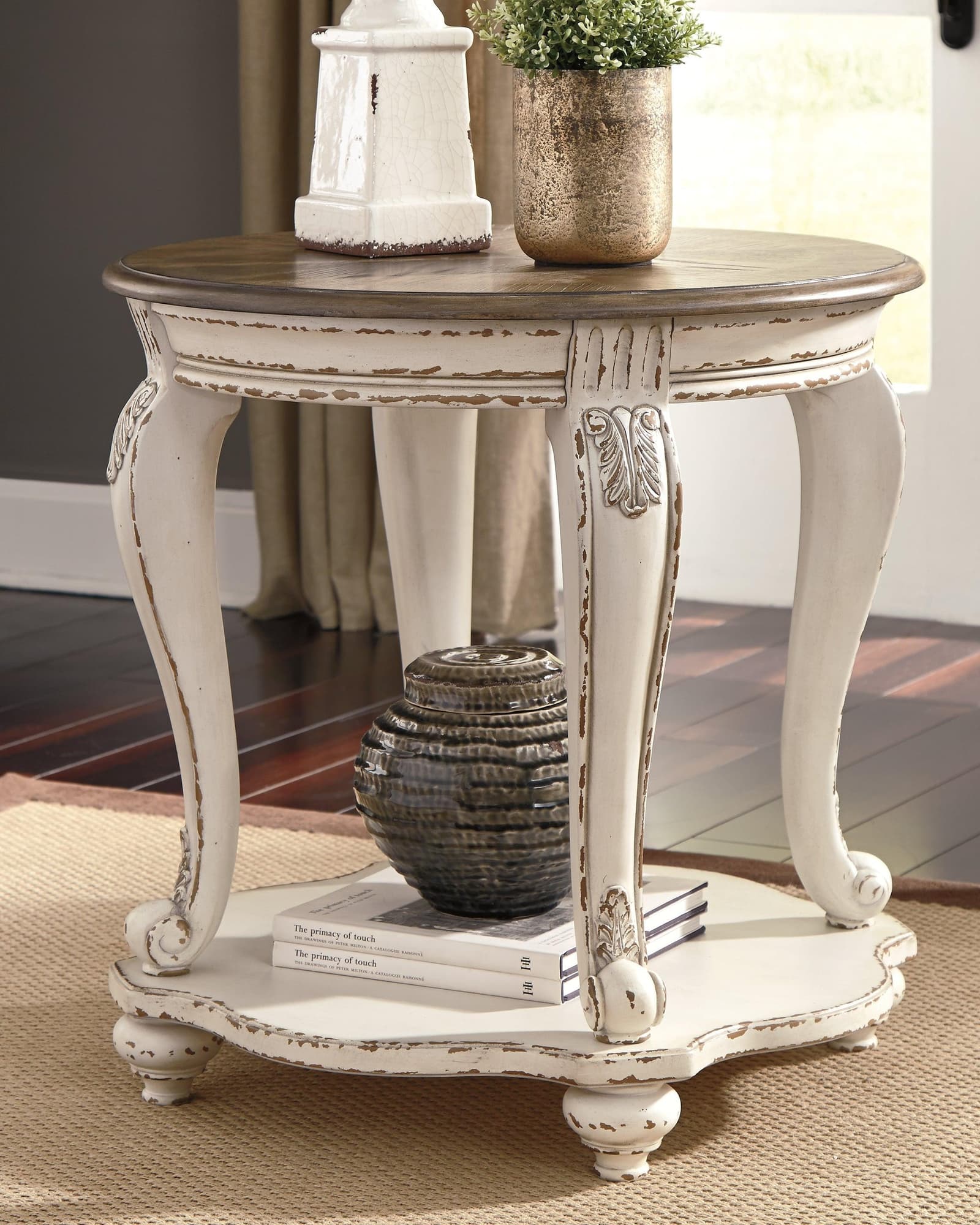 Realyn White Brown End Table - Image 1