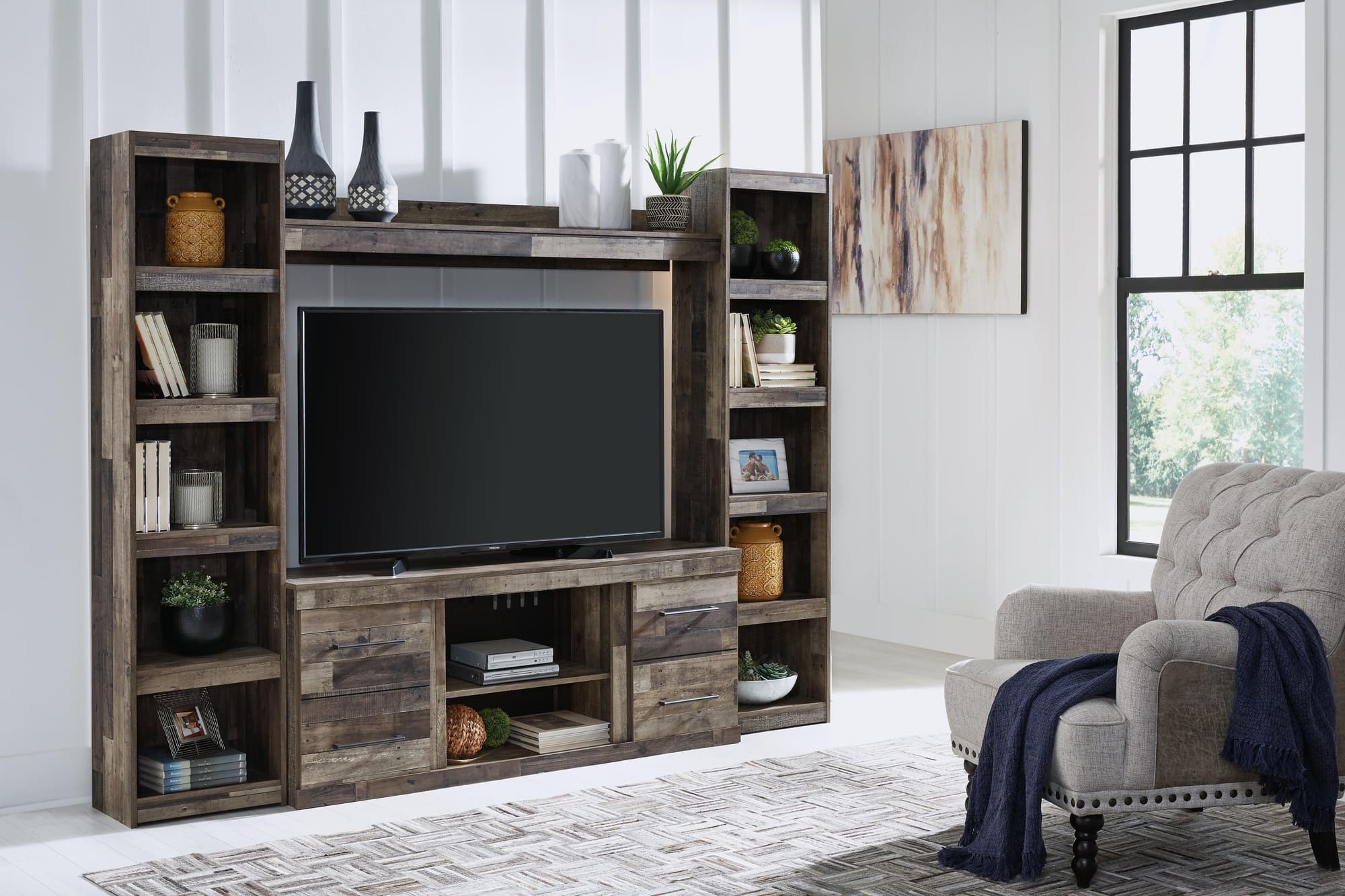 Derekson Multi Gray 4-Piece Entertainment Center - Image 1