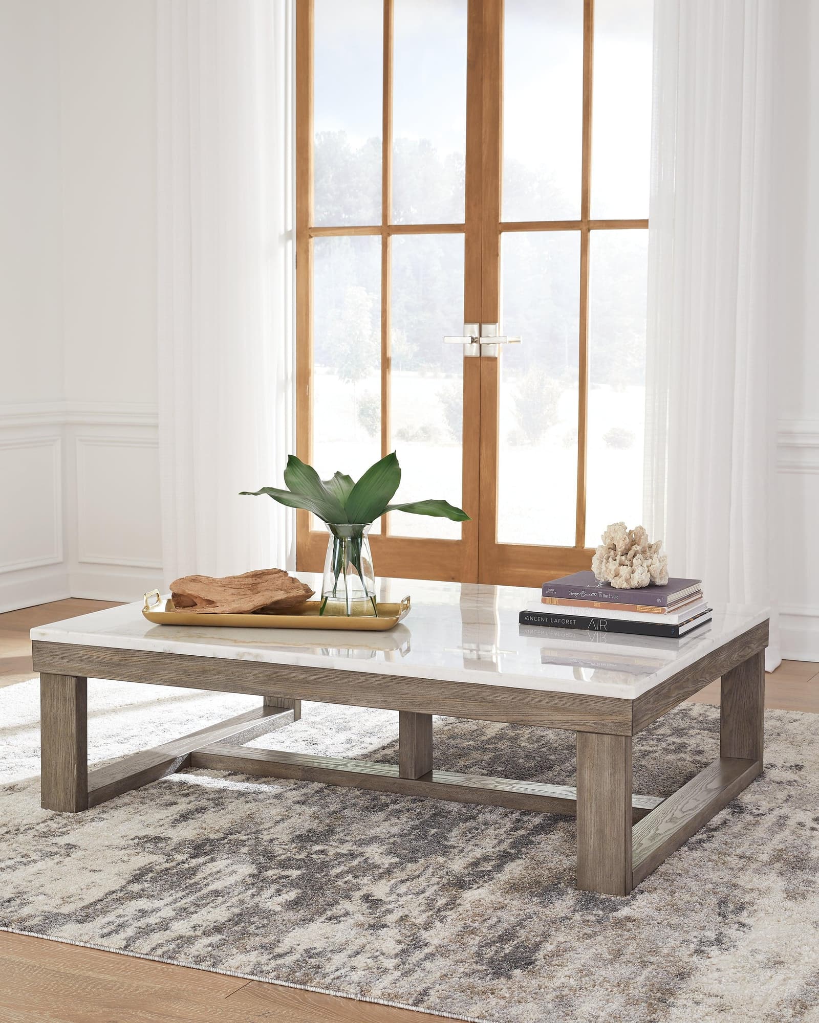 Loyaska Brown Ivory Coffee Table - Image 1