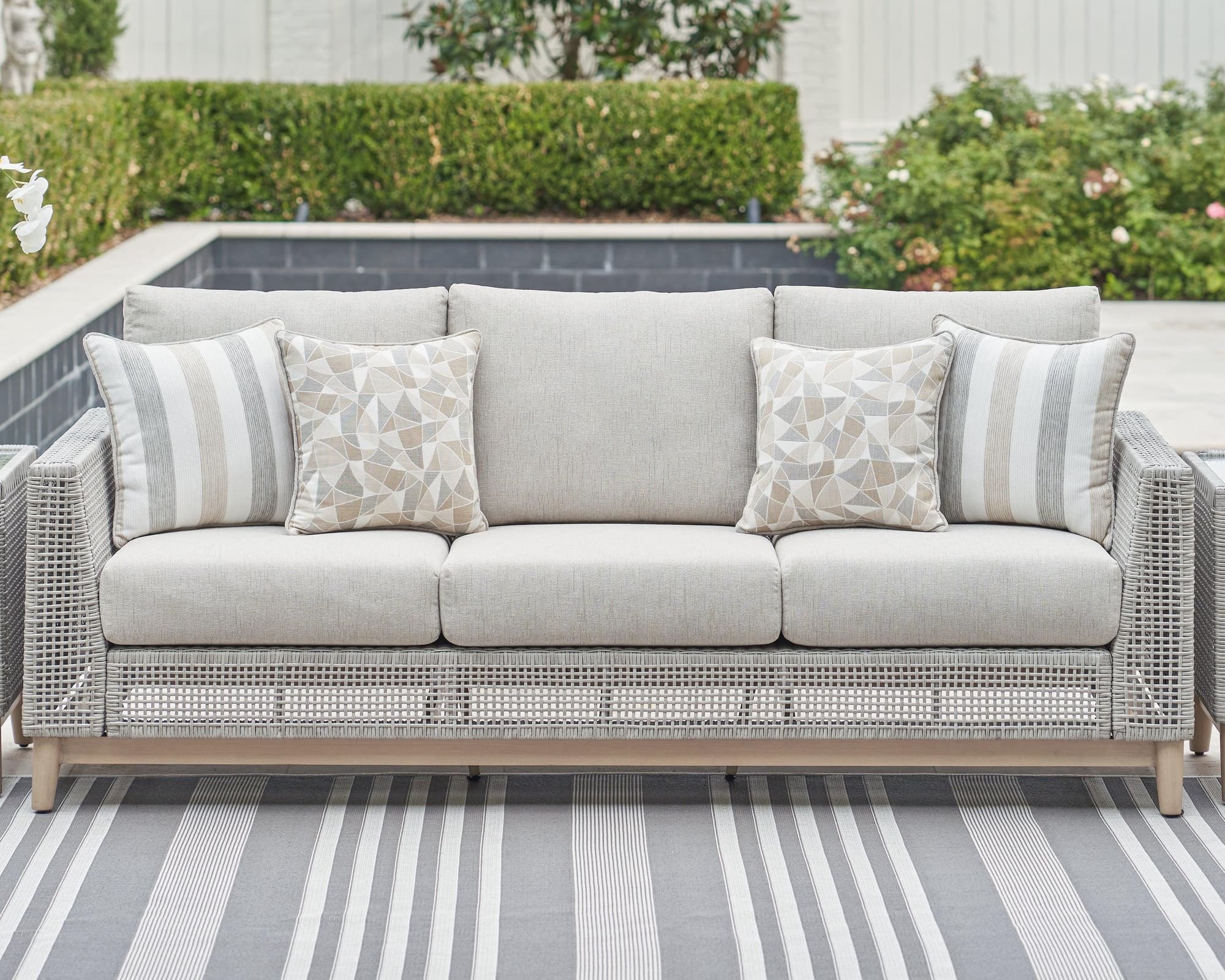 Seton Creek Gray Outdoor Sofa With Cushion - Image 1