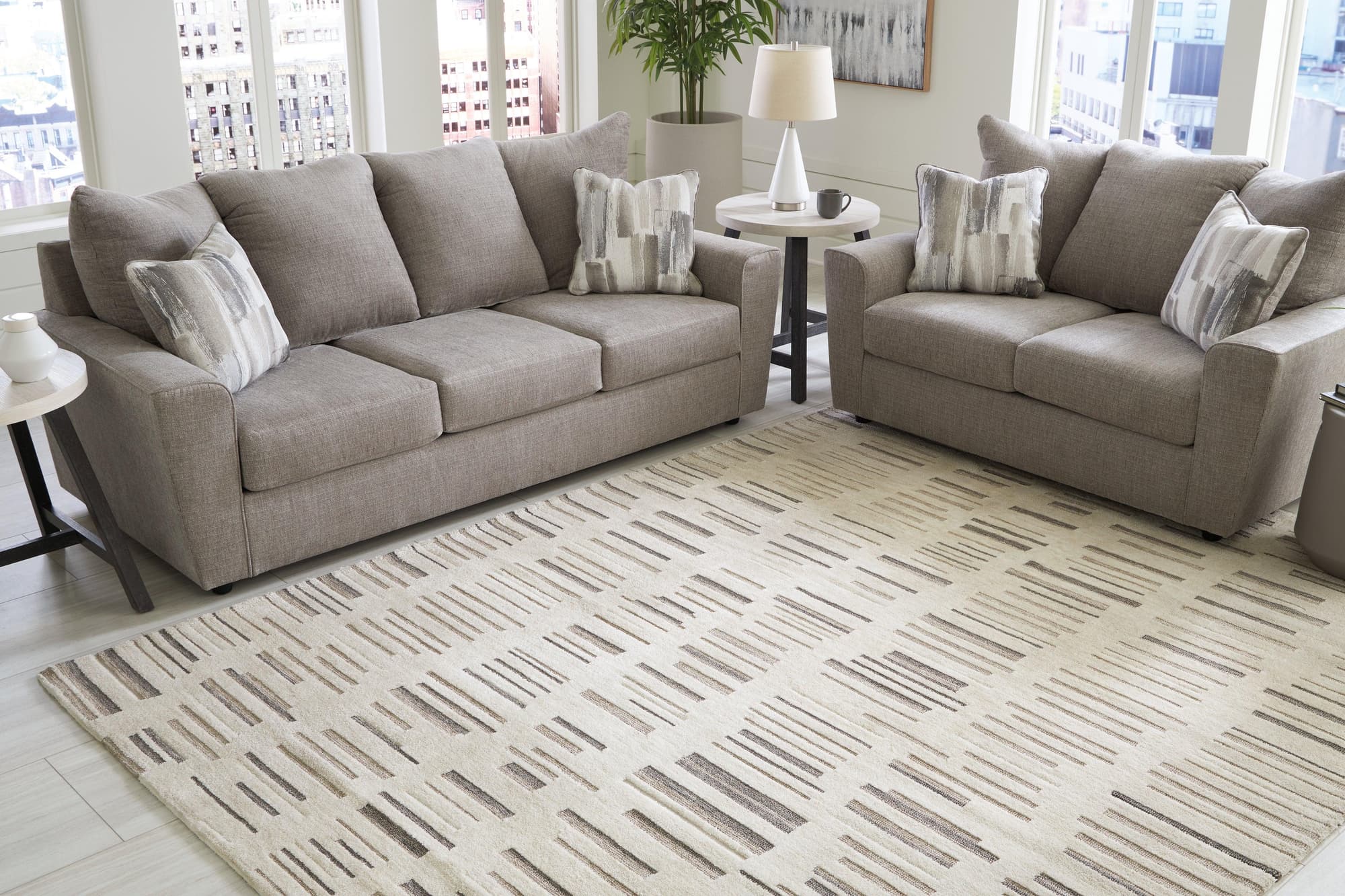 Leesdale Ivory Brown Black 8' X 10' Rug - Image 1