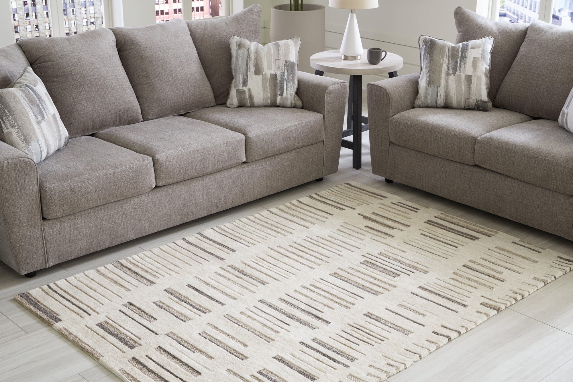 Leesdale Ivory Brown Black 5' X 7' Rug - Image 1