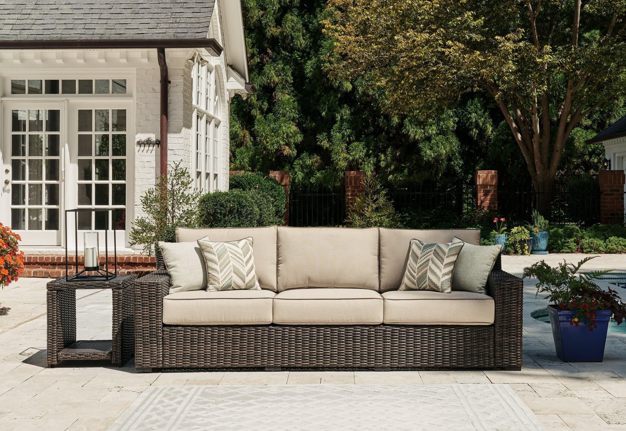 Coastline Bay Brown Outdoor Sofa With Cushion - Image 1