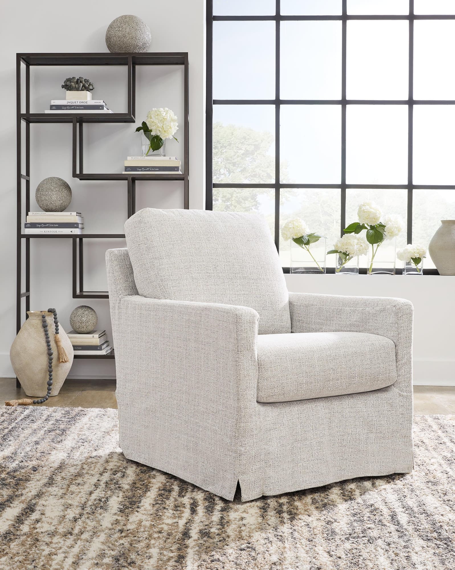 Nenana Next-Gen Nuvella Stone Swivel Glider Accent Chair - Image 1