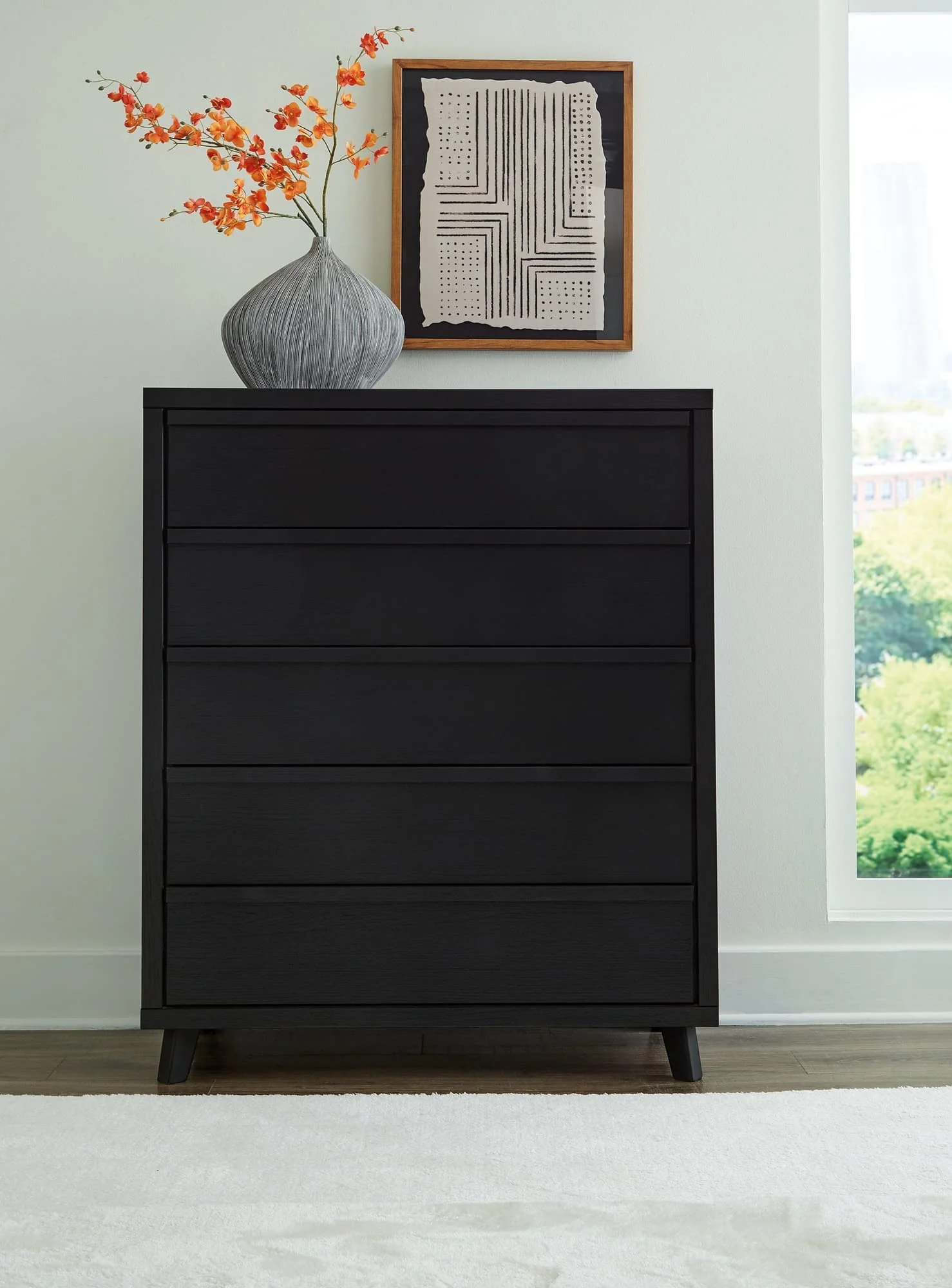 Danziar Black Wide Chest Of Drawers - Image 1