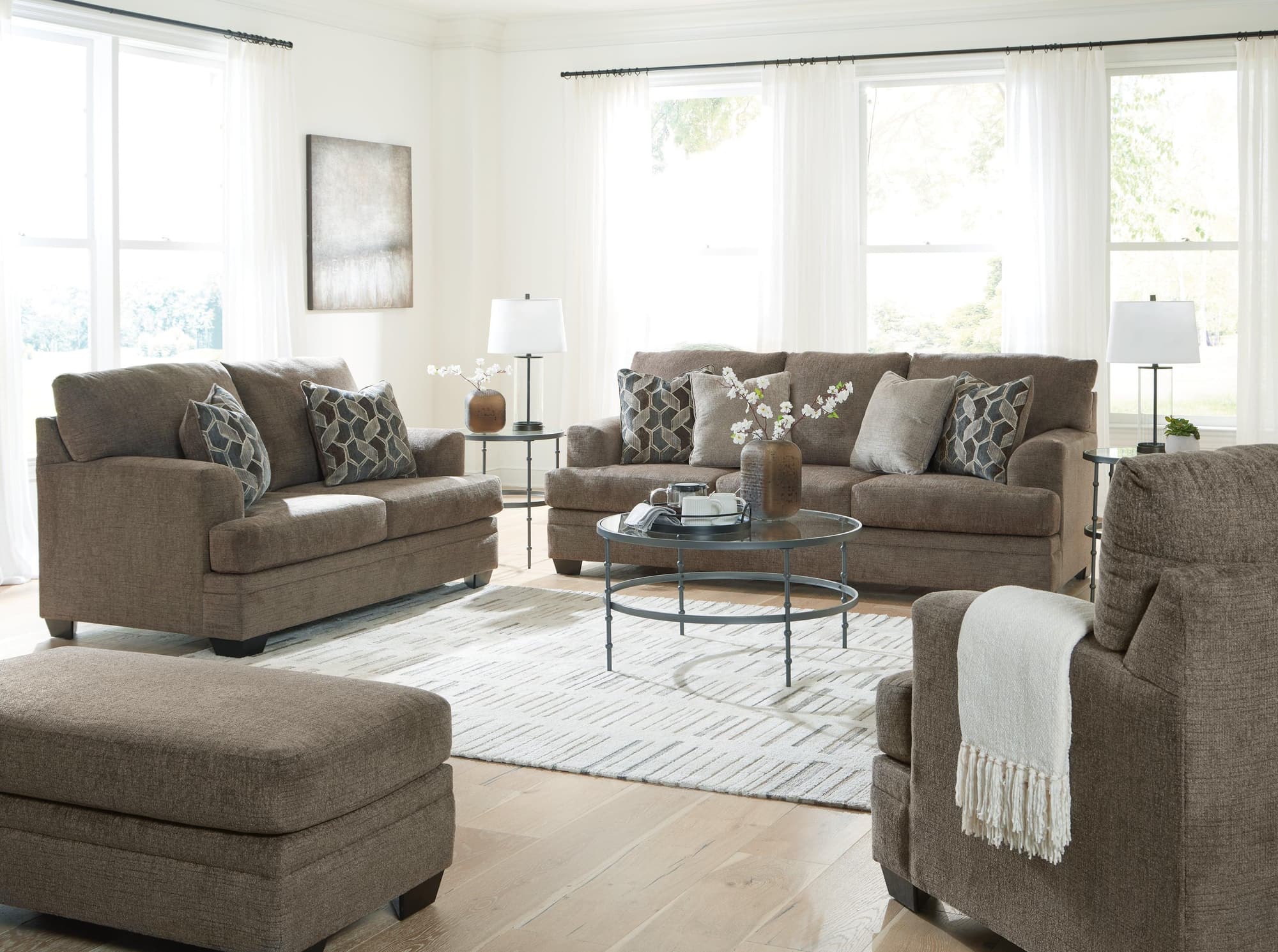 Stonemeade Nutmeg Sofa Loveseat Chair And Ottoman - Image 1