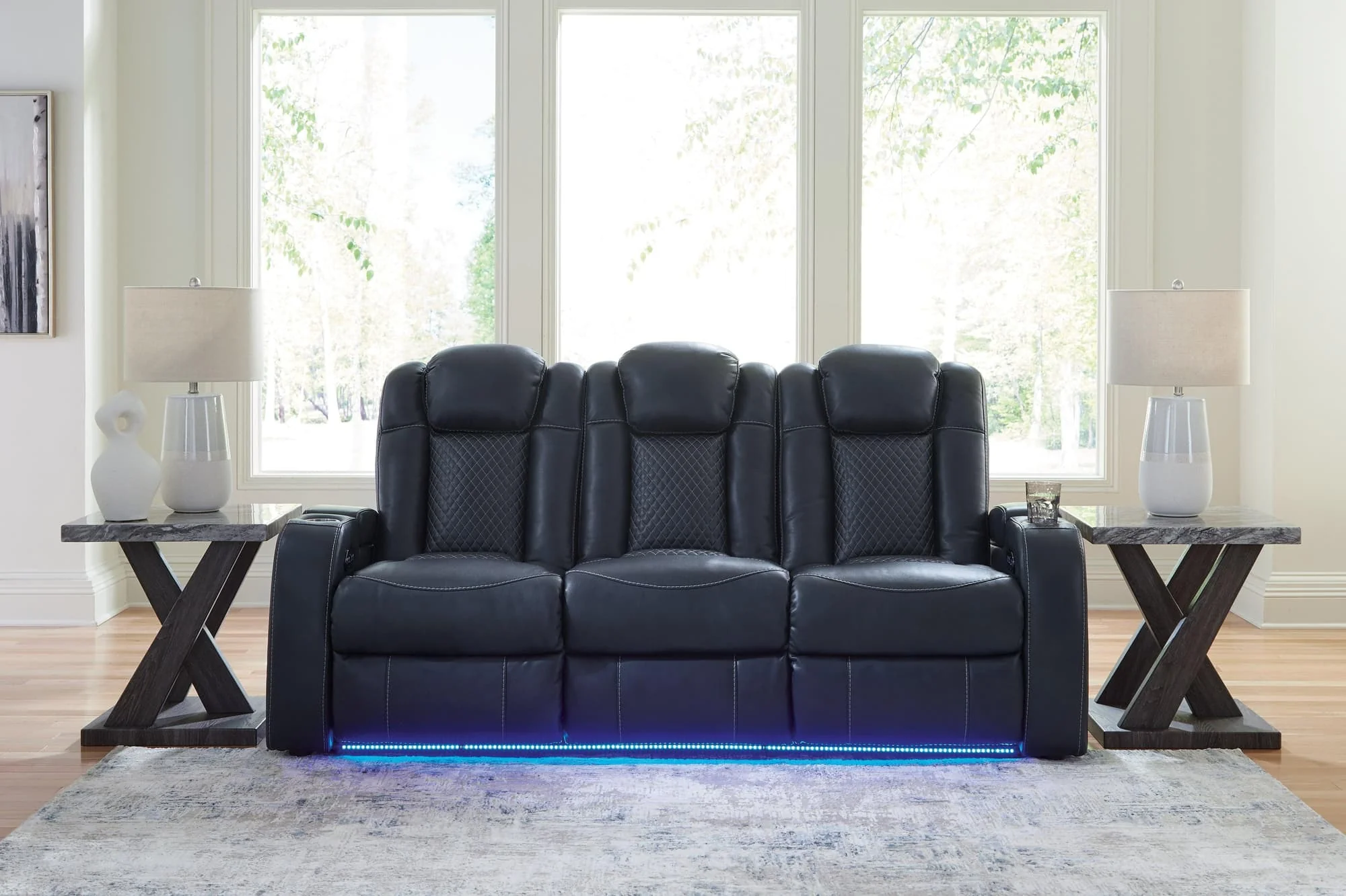 Fyne-dyme Sapphire Faux Leather Power Reclining Sofa - Image 1
