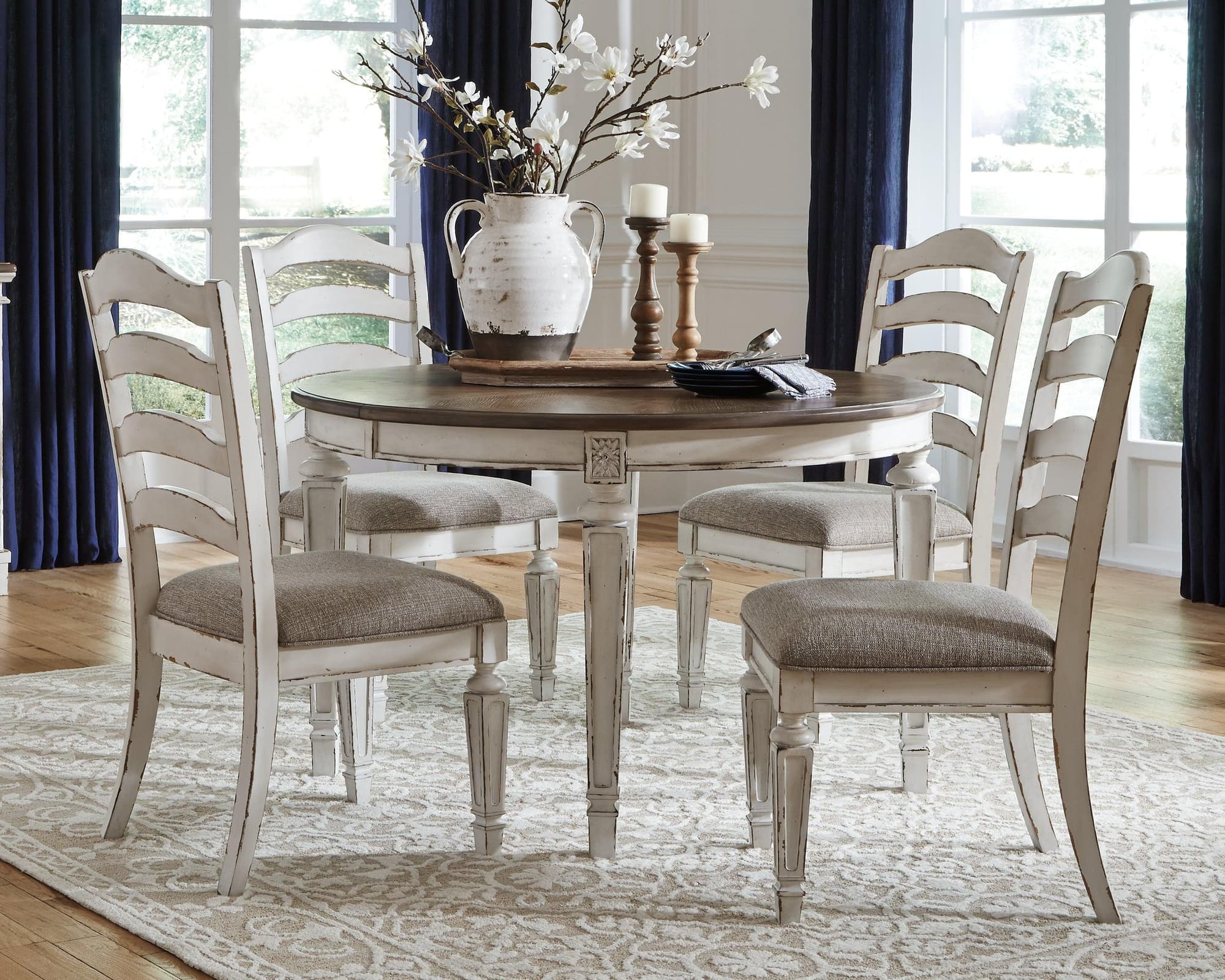 Realyn Chipped White Oval Dining Room Set - Image 1
