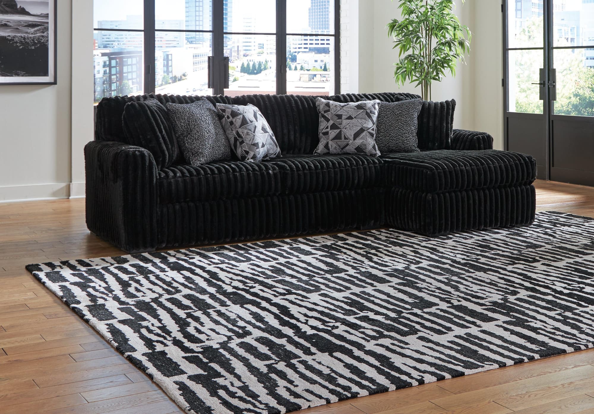 Midnight-Madness Onyx Velvet 2-Piece Sectional Sofa with Chaise - Image 1