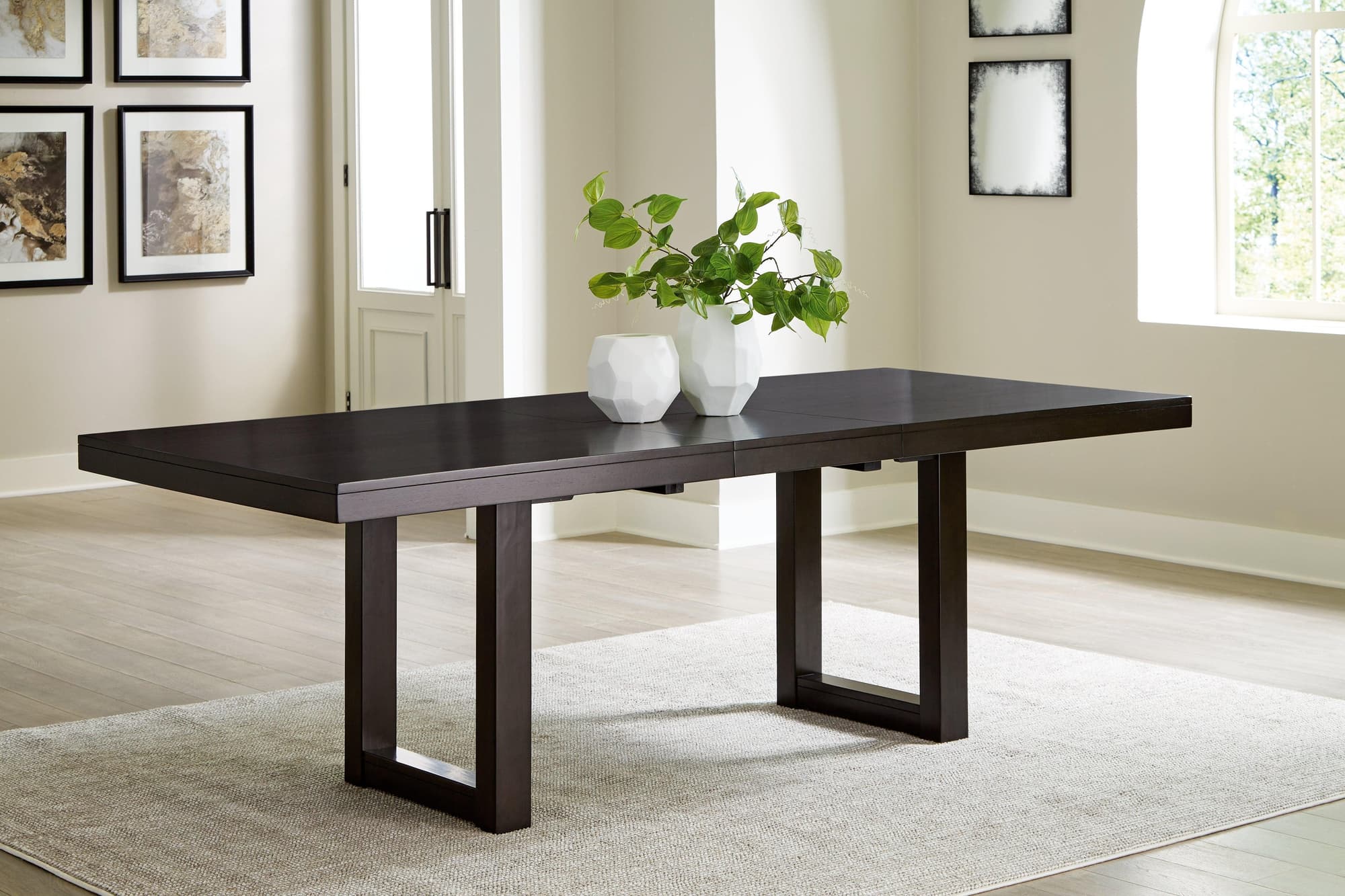 Neymorton Dark Grayish Brown Dining Extension Table - Image 1