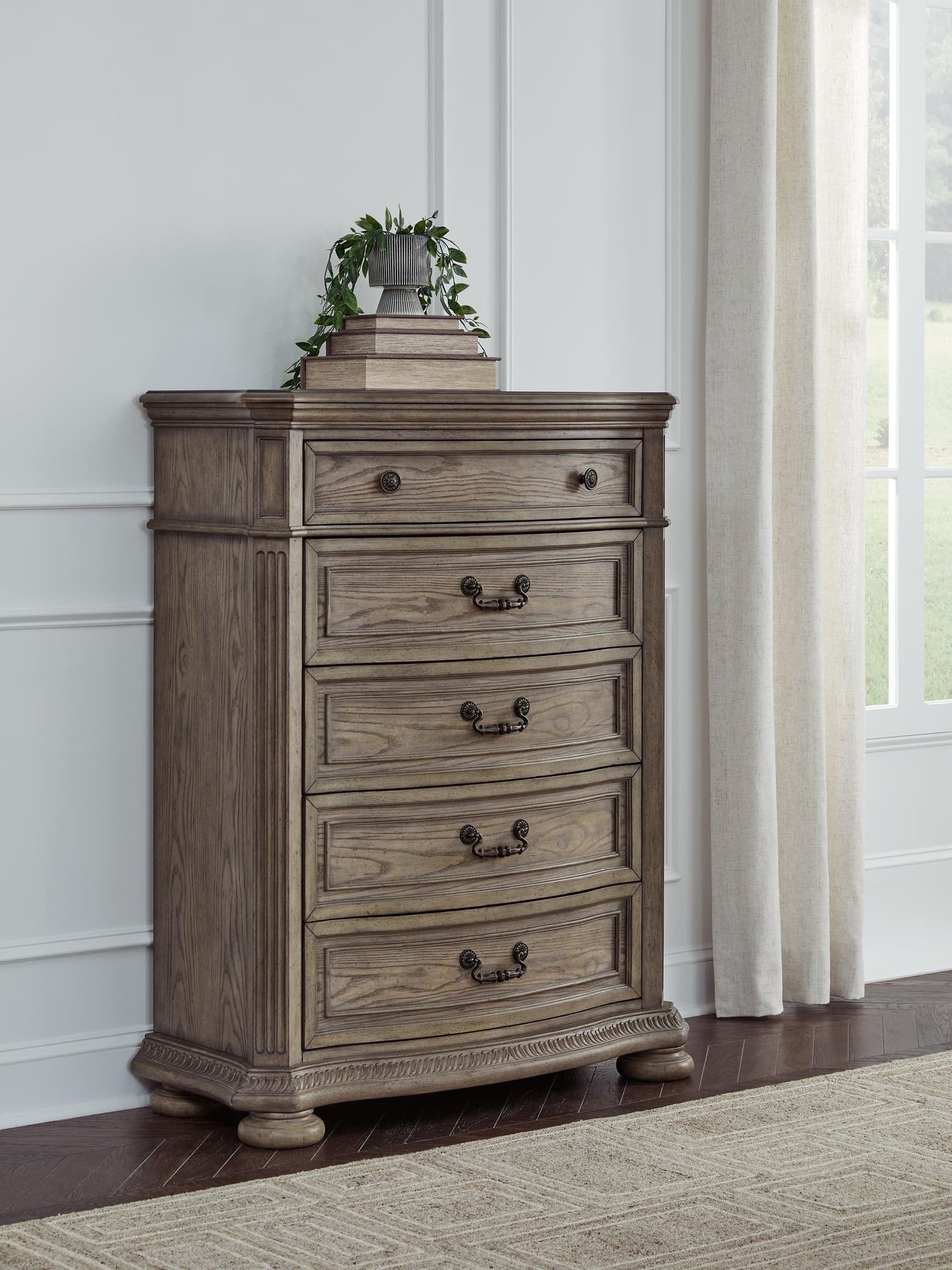 Ardenfield Light Brown Chest of Drawers - Image 1