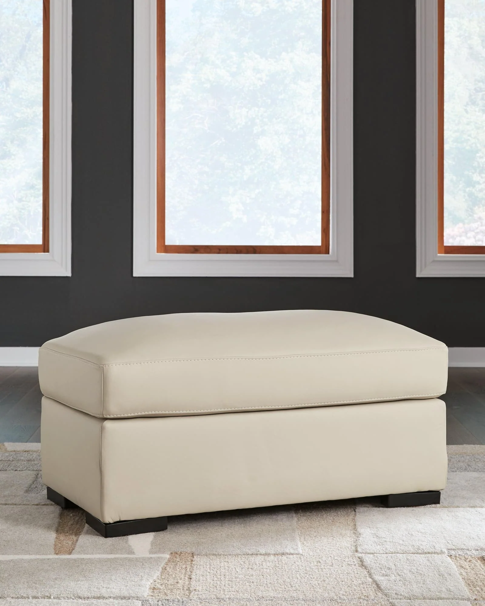 Treasure Trove Almond Leather Ottoman - Image 1