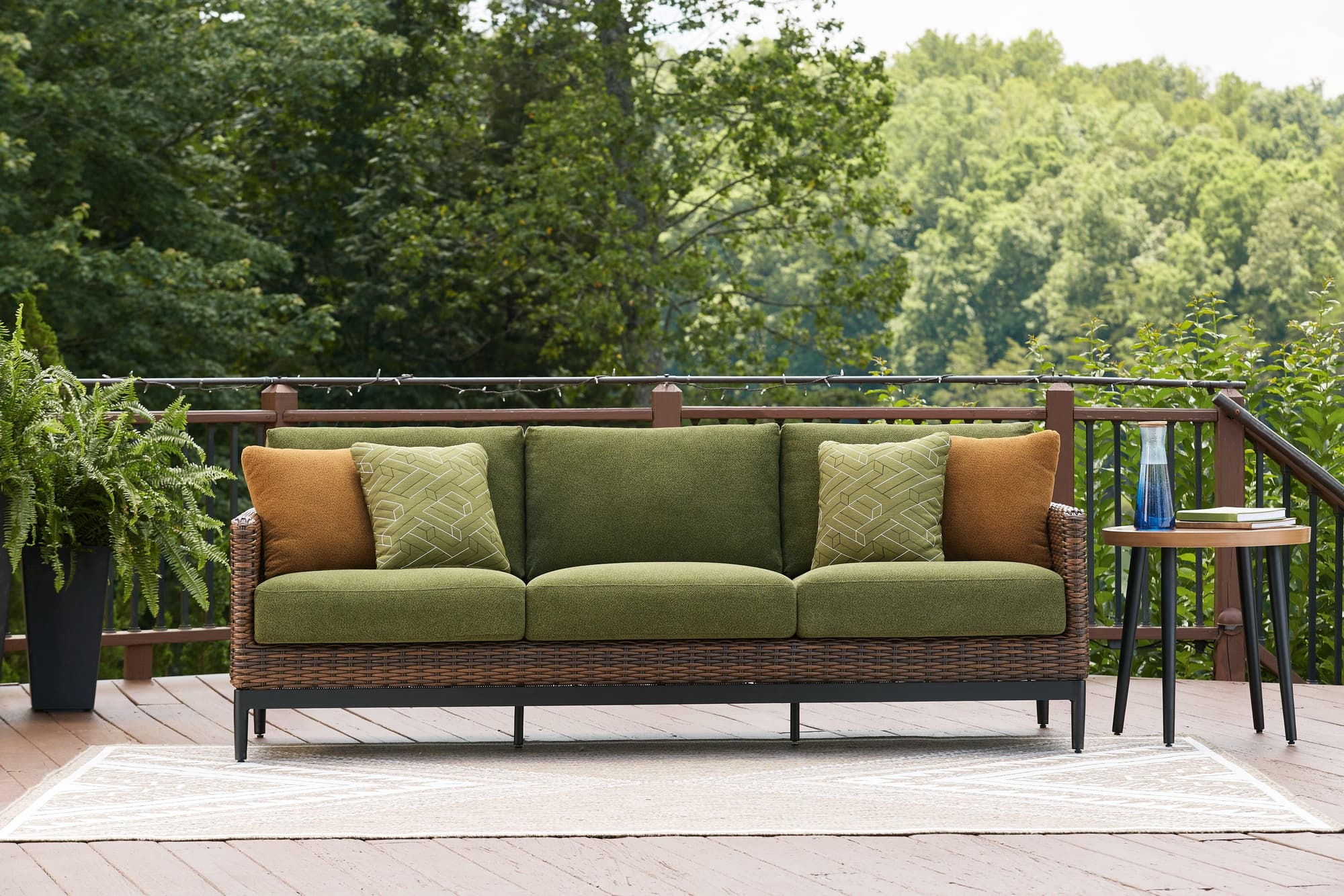Horizon Hall Brown/Green Outdoor Sofa with Cushion - Image 1