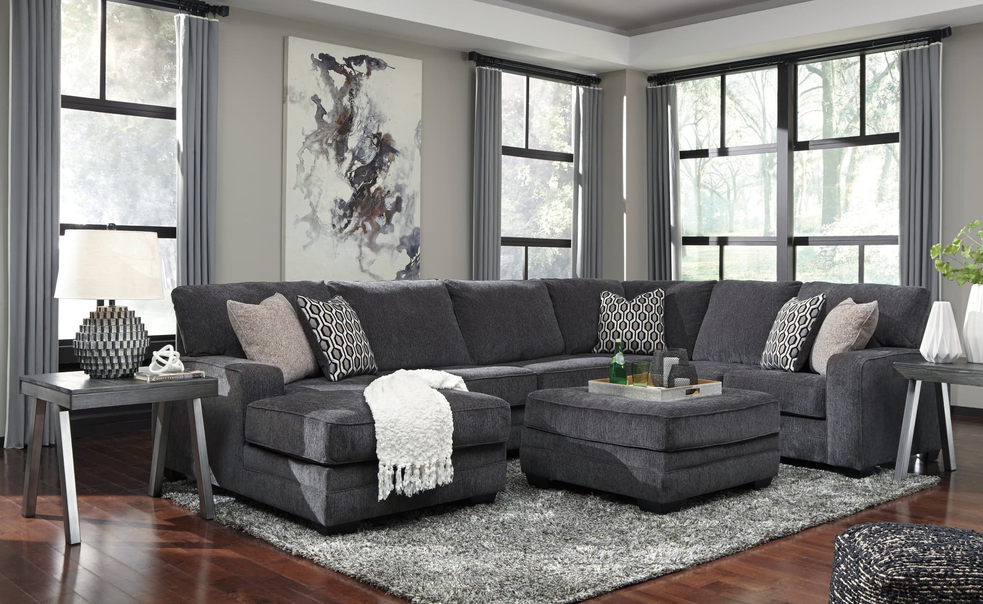 Tracling Slate 3-Piece Sectional with Ottoman - Image 1