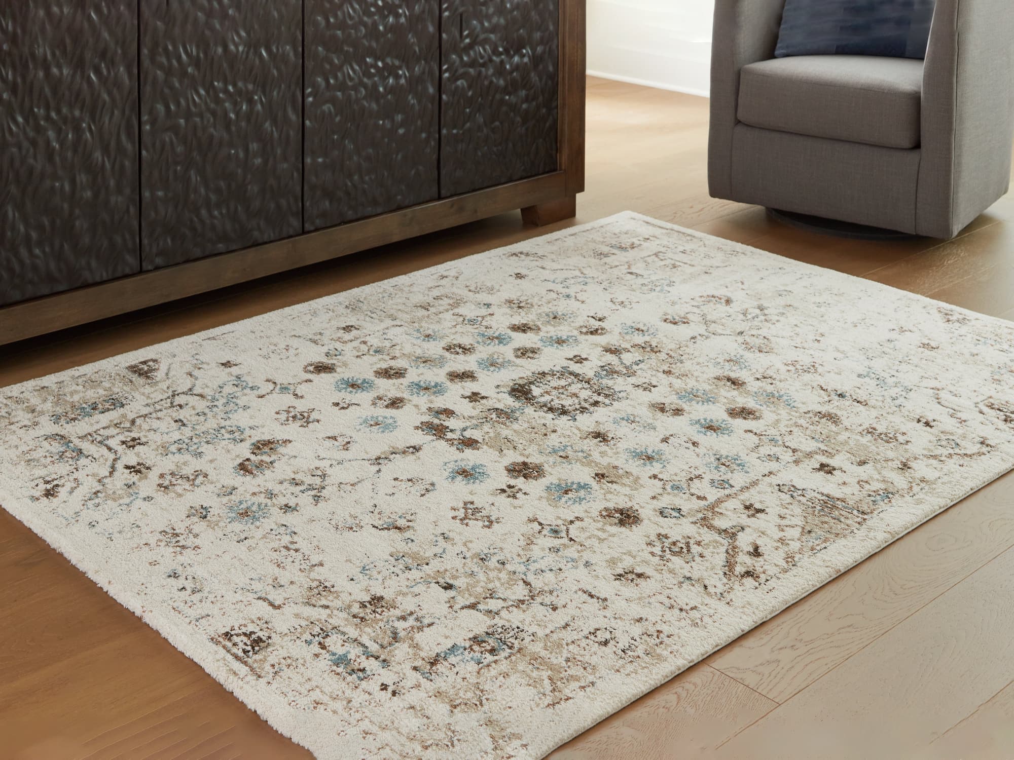 Jossler Ivory/Brown/Teal 5' x 7' Rug - Image 1