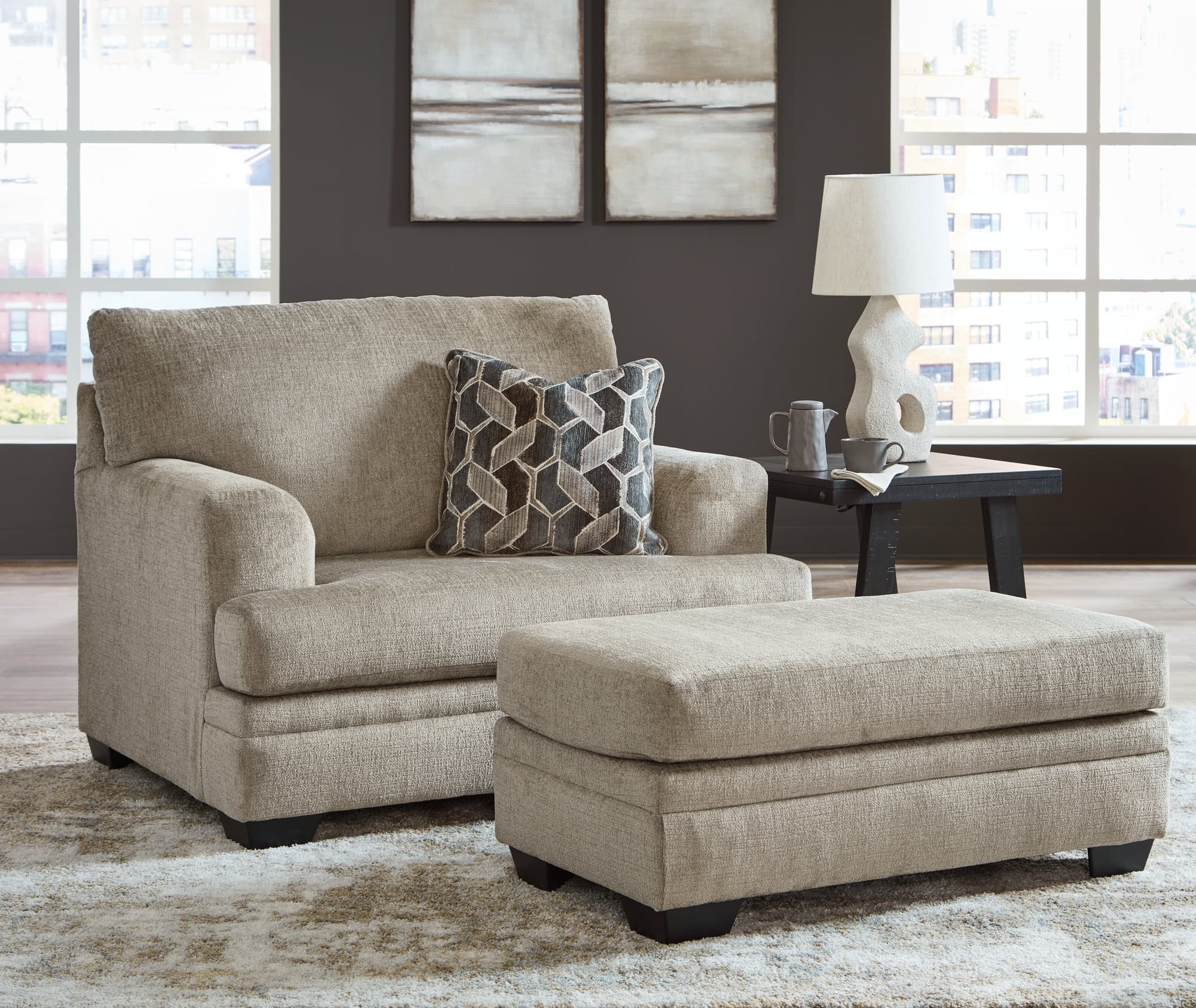 Stonemeade Taupe Chair and Ottoman - Image 1