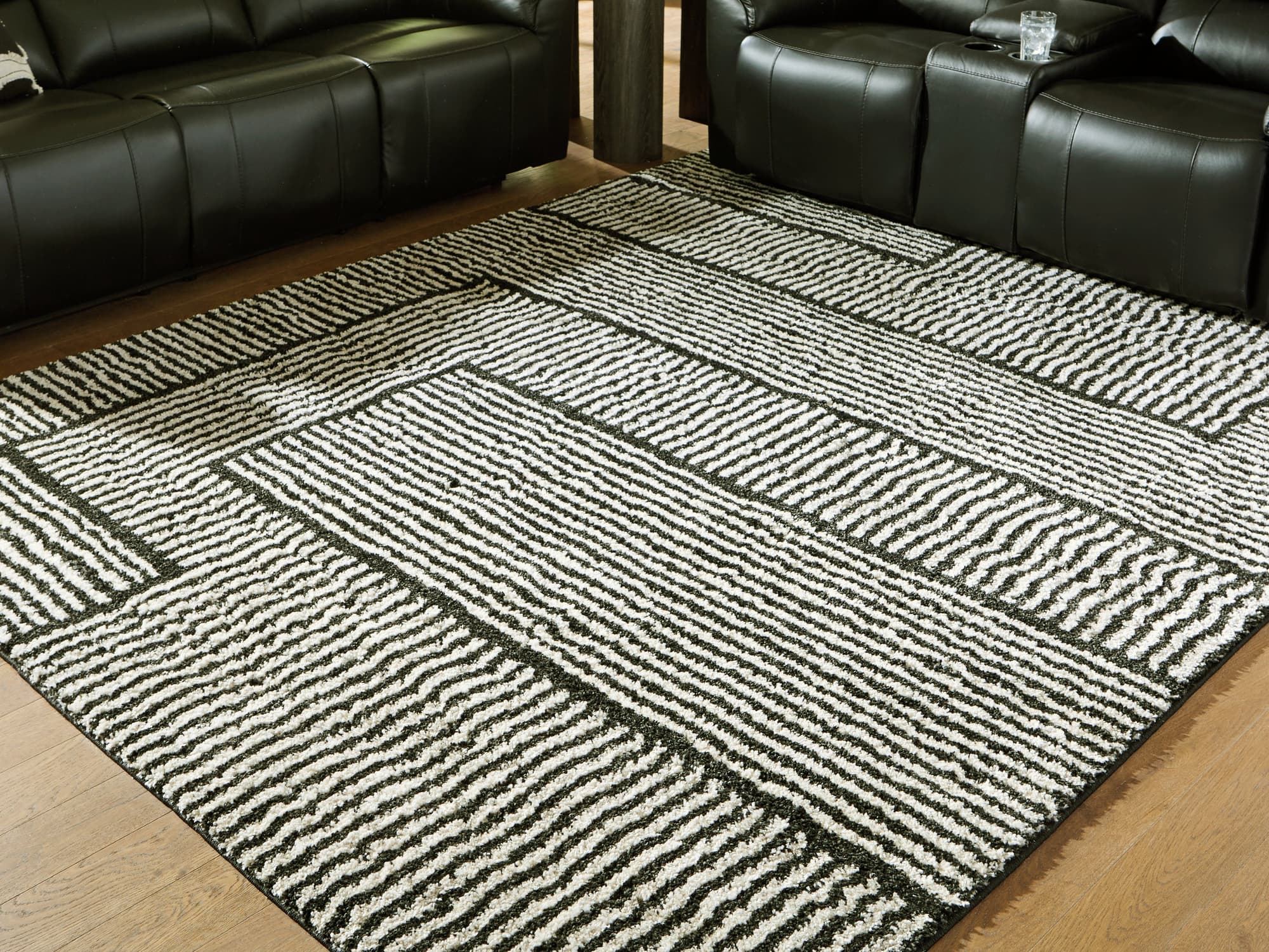 Kurtmen Black/Ivory 7'10" x 9'10" Area Rug - Image 1