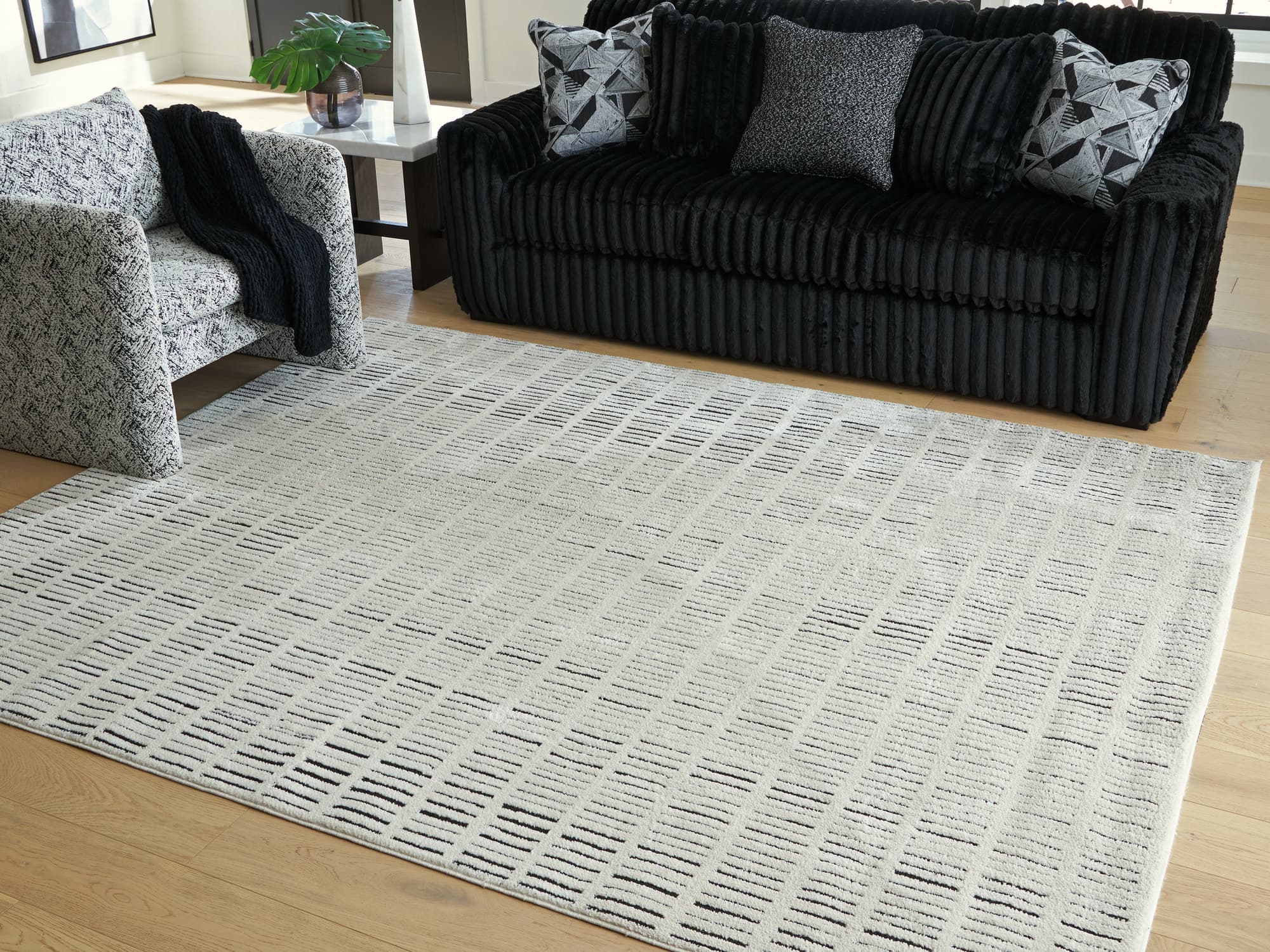 Turinwith Ivory/Black 7'10" x 9'10" Area Rug - Image 1