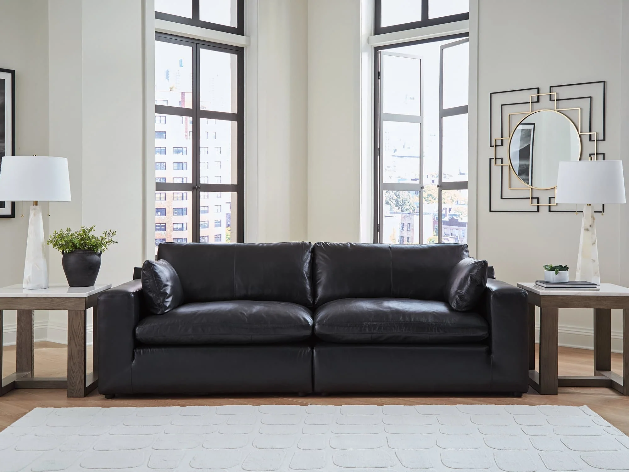 Emilia Black Leather 2-Piece Sectional Loveseat - Image 1