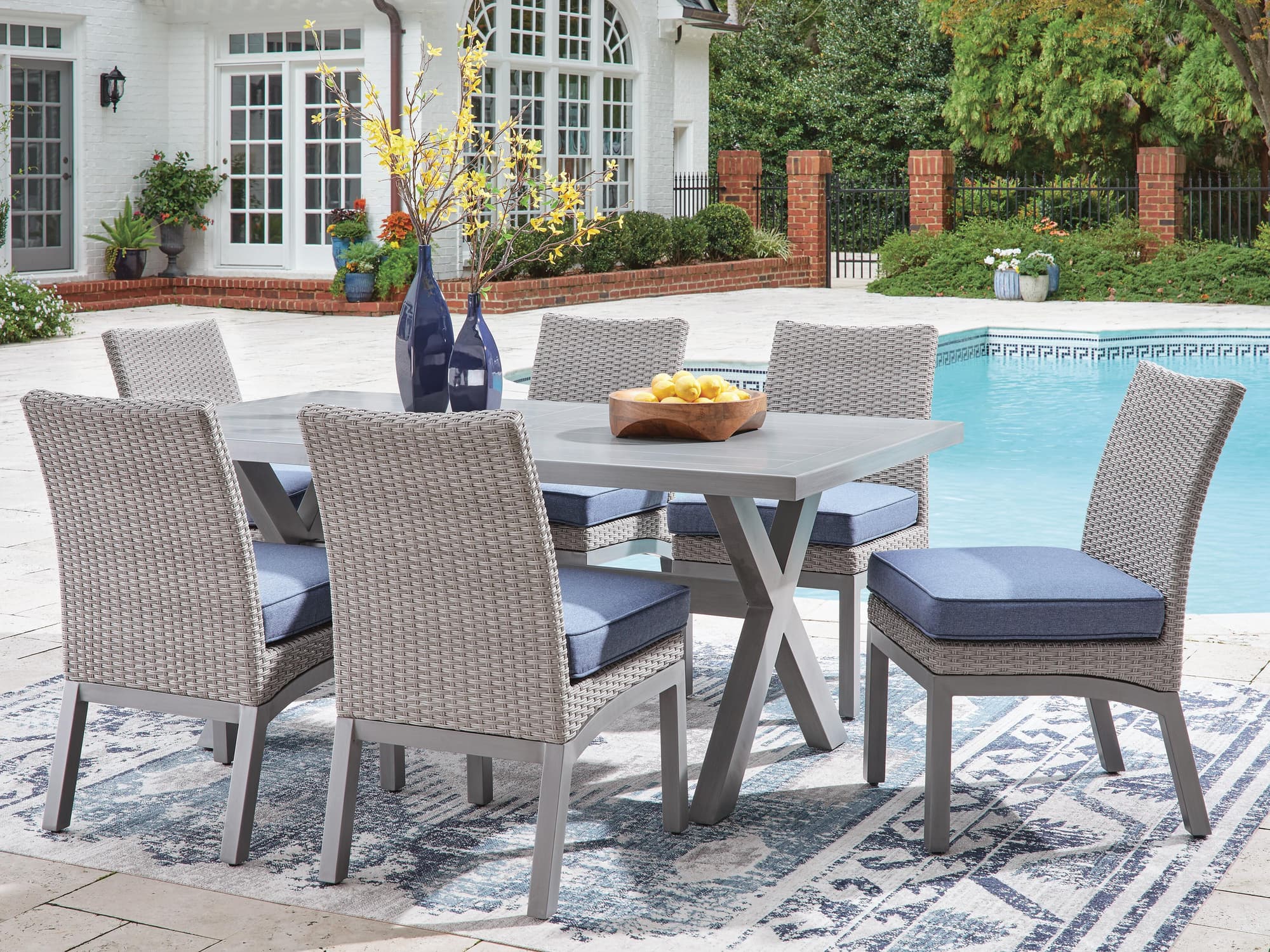 Half Gray Moon Beach Outdoor Dining Table and 6 Chairs