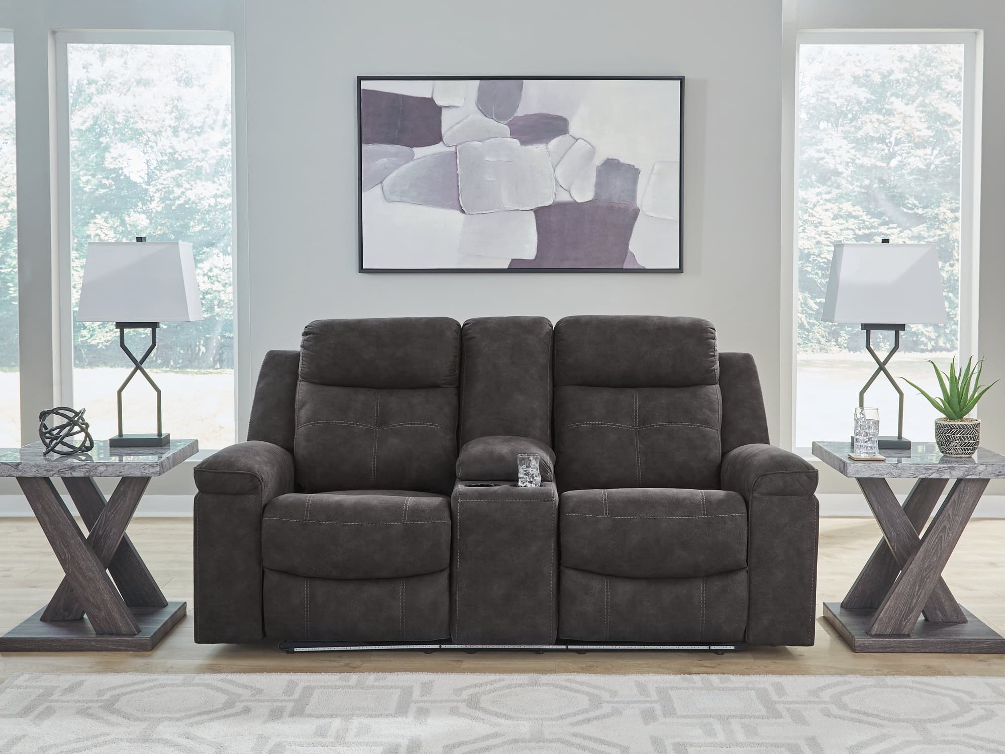 Brysonview Charcoal Faux Leather Reclining Loveseat with Console