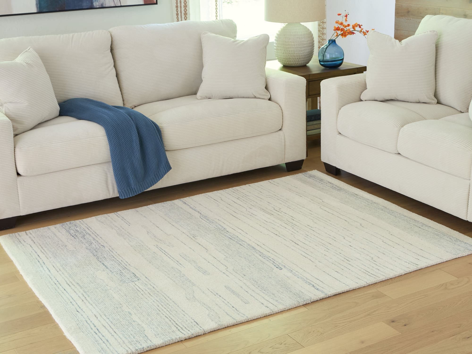 Genemost Ivory/Blue 5' x 7' Area Rug - Image 1