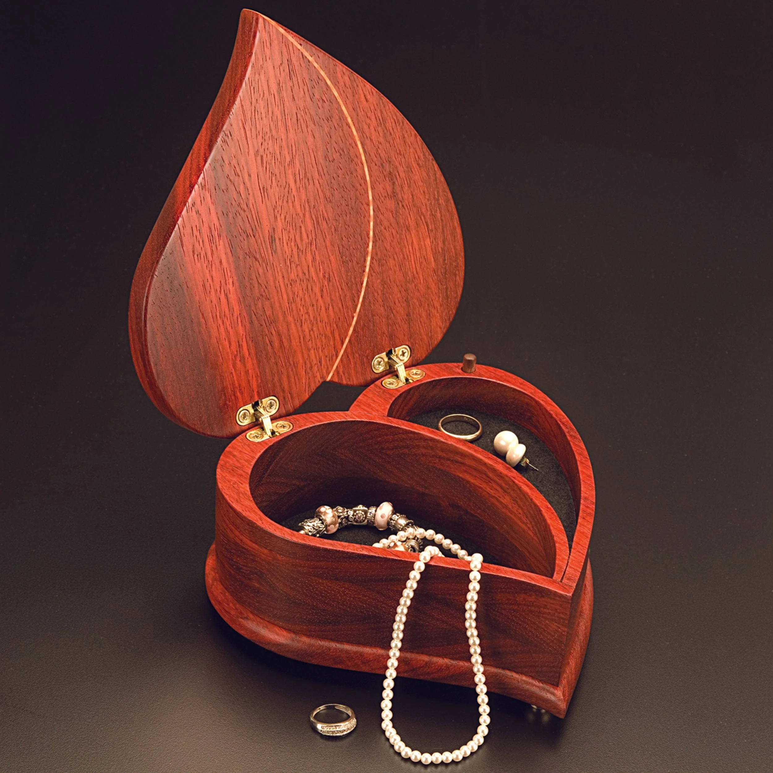 Woodworking Project Paper Plan to Build Heart Shaped Music Box - Image 1