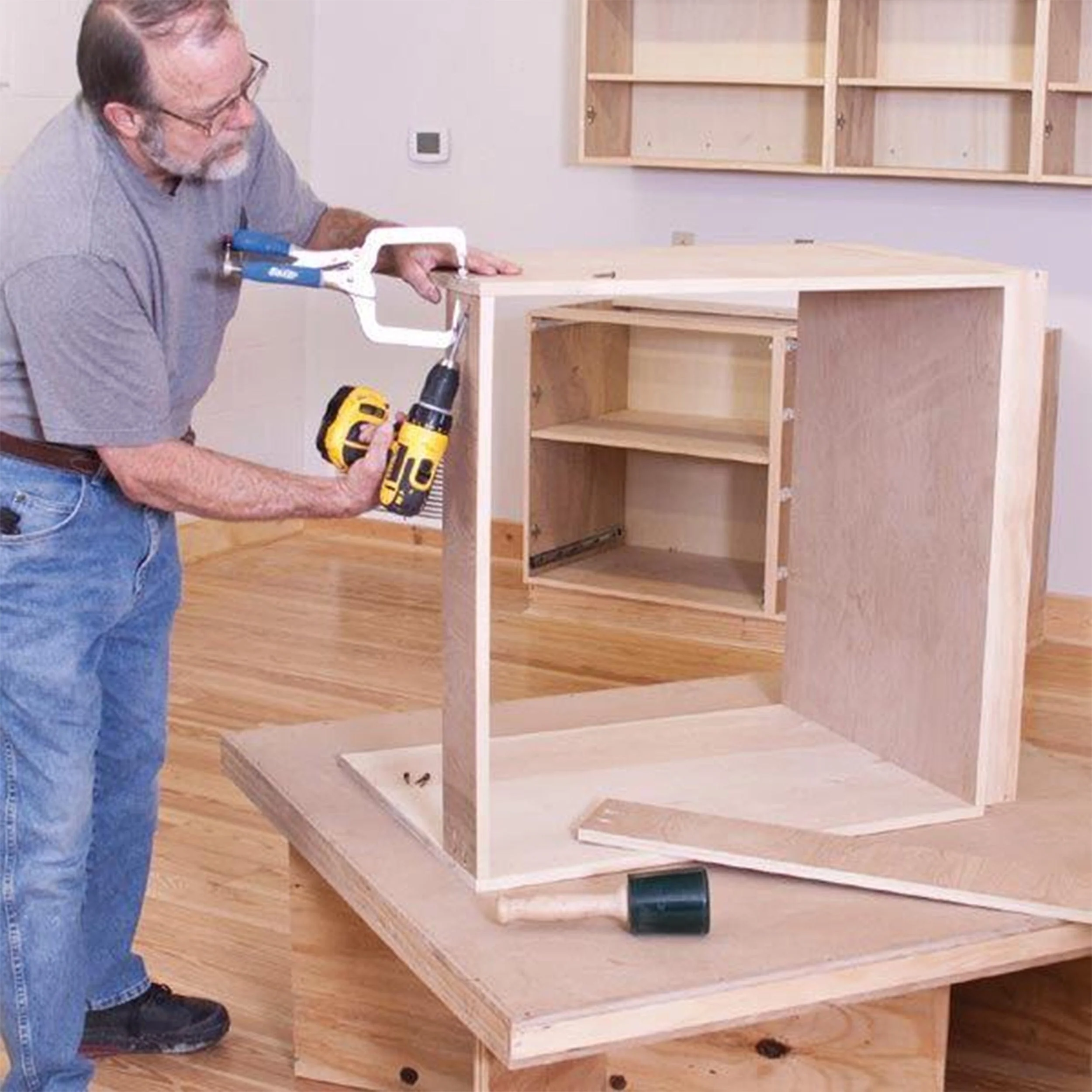 Woodworking Project Paper Plan to Build Hassle Free Workshop Cabinets - Image 1
