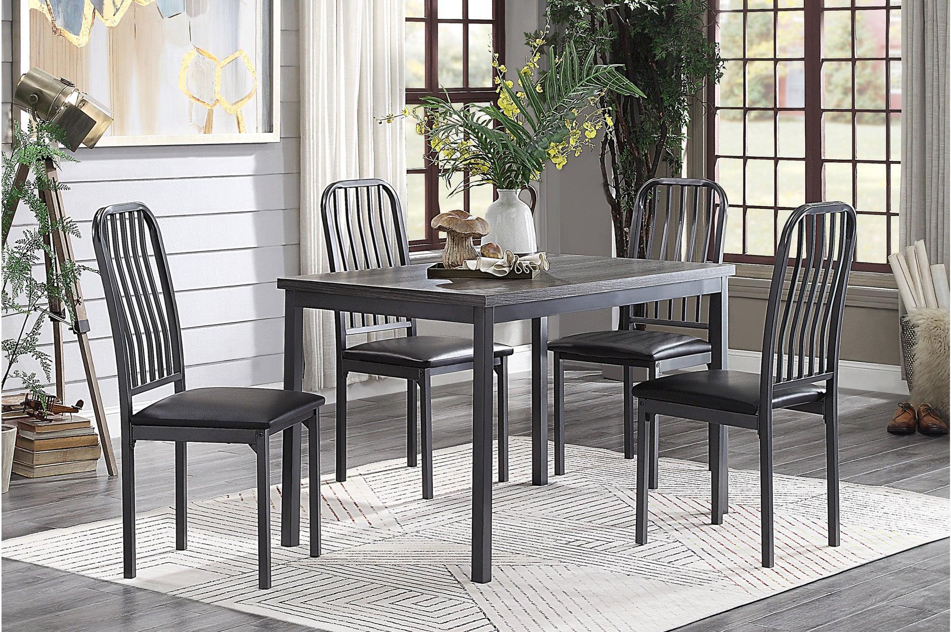 Tripp Black Hued Faux Leather Dining Room Set - Image 1