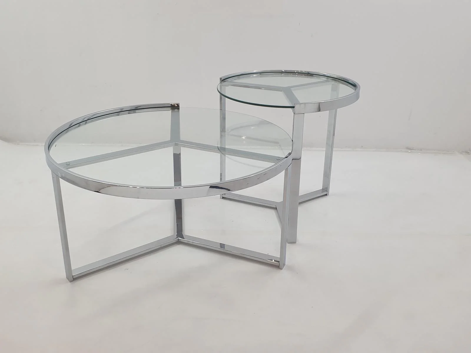 Delia 2-Piece Round Glass Top Nesting Coffee Table Clear Chrome - Image 1
