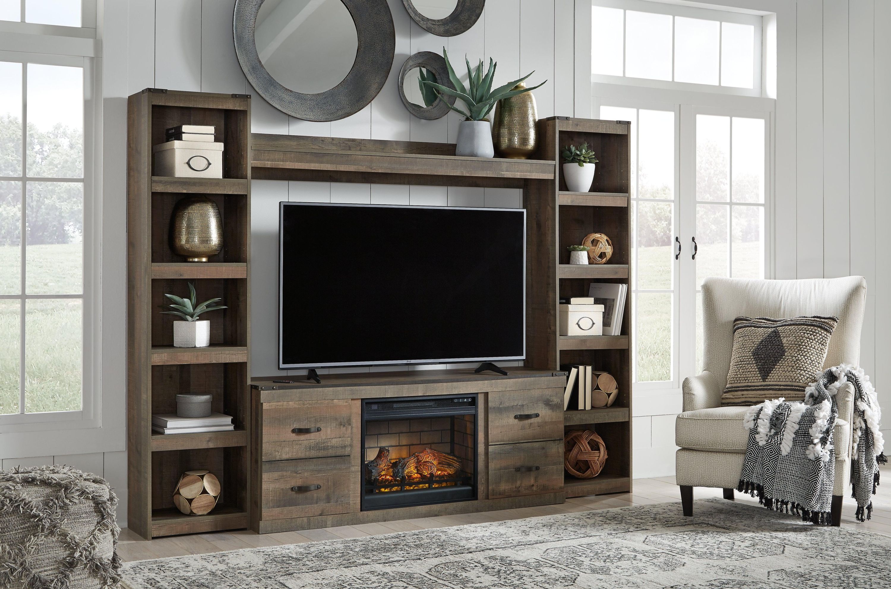Trinell Brown 4-Piece Entertainment Center With Electric Fireplace - Image 3