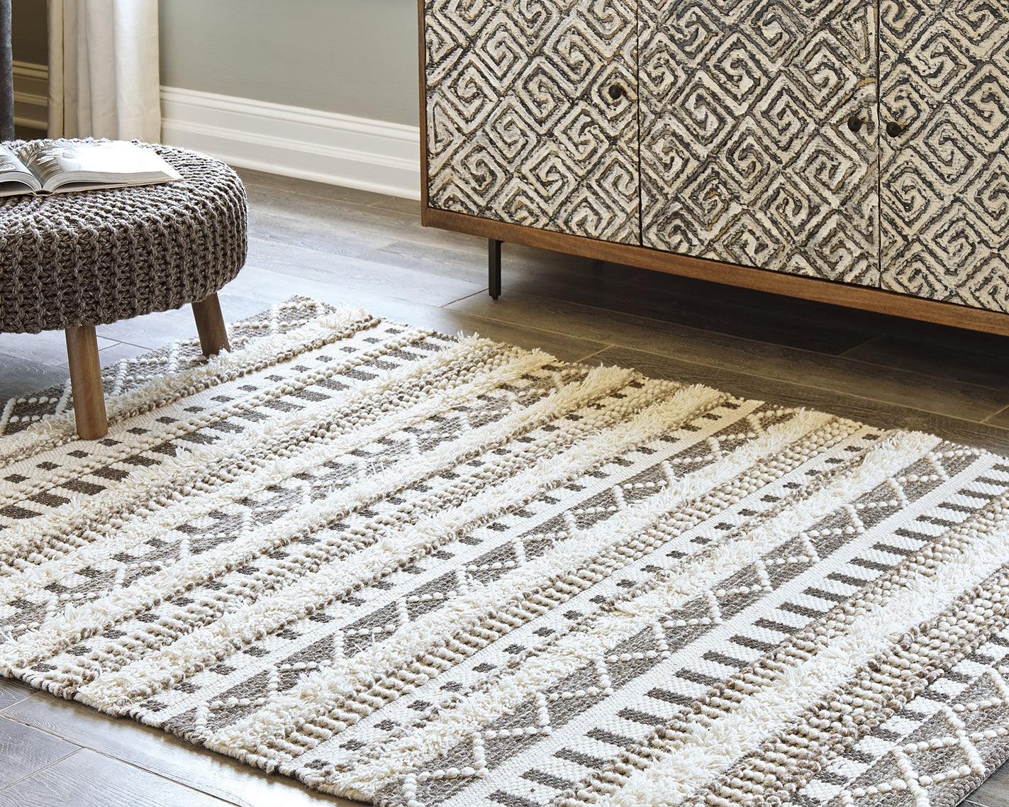 Karalee Ivory Brown 5' X 7' Rug - Image 1