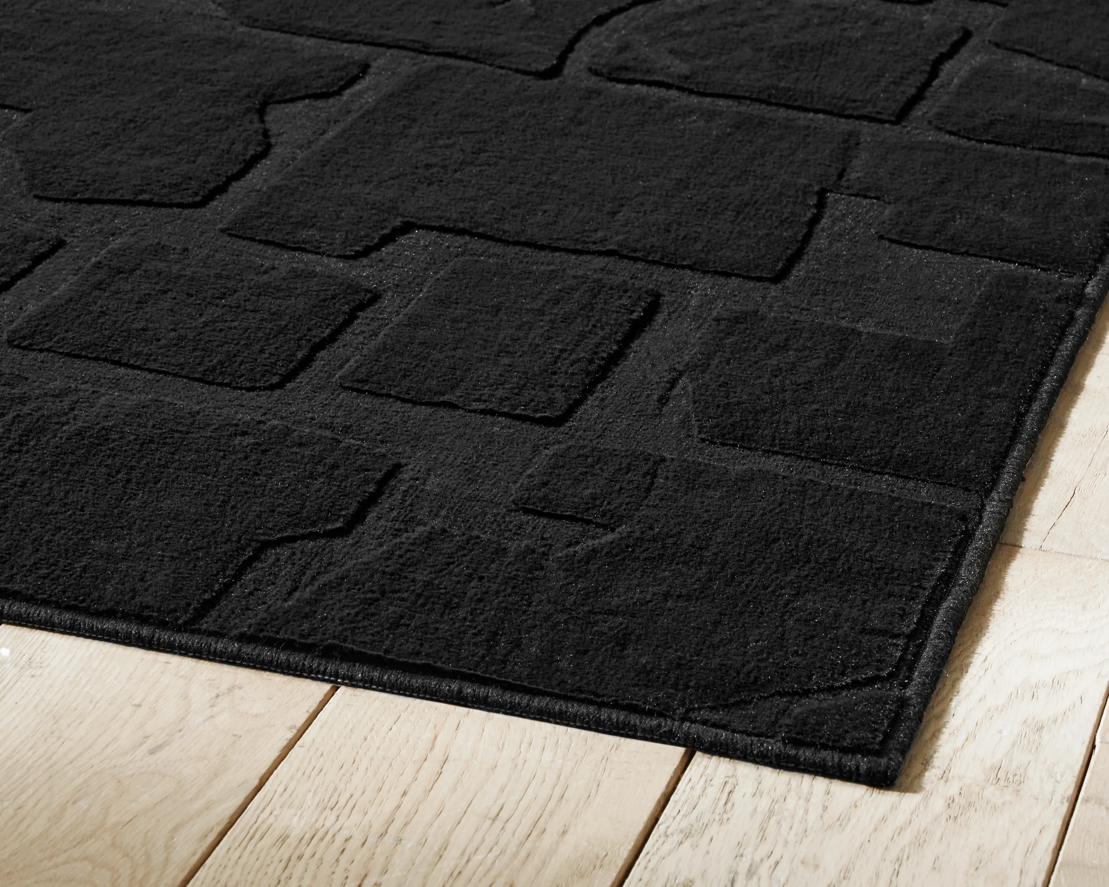 Gibbswell Black Washable 5' x 7' Area Rug - Image 3